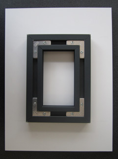 A float mount hanger gives the illusion your image is floating off the wall