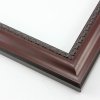 This shallow reverse scoop frame features a smooth face in a deep mahogany wash with a subtle view of the natural wood grain. The inner lip is a horseshoe relief design in black, and the black outer edge has a slight bevel.
1.5 " width: ideal for medium size artwork. The simple elegance of this frame makes it the perfect border for photographs, paintings and giclee prints.