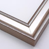 This frame features a deep crown moulding profile finished in silver leaf. An antique look is achieved with a gentle brushed effect that highlights the corners of the bevelled edges.
2.125 " width and 1.25 " depth: ideal for medium to large images. Border a black-dominant grayscale photograph or acrylic painting with this stylishly simple frame.