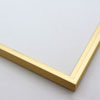 This metal picture frame has a smooth, frosted gold finish, brush-textured drop edge and a curved profile. The classic flat face makes this frame ideal for small, medium and large-size artwork.
.3 " width. Easily frame photographs, paintings or drawings on paper, or even Giclée canvas prints.