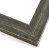This simple, flat faced frame features rustic wood lightly coated in charcoal grey/black paint. The top coat is rubbed away in places to reveal the natural wood color below, for a soft, antiqued look.
1-1/2 " wide: ideal for small and medium-size images. Whether photography or paintings, rural scenes and simple images will look striking in this frame.