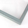 This simple, flat faced frame features rustic wood with a light wash. The natural grain and wood color shows through the sanded, grey-blue varnish, giving the frame a soft, antiqued appearance.
3/4 " wide: ideal for small and medium images. Whether photography or paintings, rural scenes and simple images will look striking in this frame.