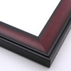 This solid wood frame has a shallow scoop profile and matte black edging. The face features an ombre fade into and out of a rich mahogany with a faint wood-grain finish.
2 " width: ideal for medium or large images. This heavy frame is the perfect border for a bold watercolour or oil painting, or print.