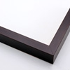 This dark brown frame features a slim, simple face and natural, wood grain finish. Dress it up with an old watecolour or oil painting, or keep it modern with a family photograph. The deep (1-1/16") rabbet adds depth to framed images, creating a shadow-box effect.
.75 "es wide: ideal for small images.