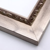 This flat profile, solid wood frame features a high scroll and dot relief design topped with silver leaf, along the inner edge. The wide surrounding edge mimics brushed silver.
2.5 " width: ideal for larger images. Highlight a traditional black and white photograph, oil painting or Giclée print. The extension of the flat outer edge beyond the relief detail ensures the frame will not detract from your image.