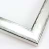 This glossy silver frame has a subtle scoop face with black distressed scratching on the outer edges. The drop edge is the same silver-foil as the face.
1-1/8 " width: ideal for small to medium size artwork. Oil or acrylic paintings, or simple portrait photographs will get a high-fashion pop from this frame.