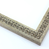 This slim, ornamented design features bevelled inner and outer edges and a celtic cross pattern in relief The solid wood frame is covered in a gold-brushed silver foil. A faint red patina gives it an antiqued look.
1.25 " width: ideal for smaller artwork. Photographs, paintings and giclee prints will shine within this detailed frame.