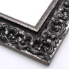 This ornate, intricate frame features a bold relief design in a black-mottled antique silver foil. The raised, roughly textured inner lip is silver foil as well.
2.75 " width: ideal for large images. Select a strong piece of artwork to avoid it being overpowered by this decadent frame.