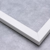 This matte white frame features a slim, smooth face. Dress it up with an old watercolour or oil painting, or keep it modern with a family photograph.
.875 "es wide: ideal for small images.