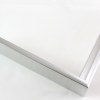 Slim 5/16 " metal frame. This frame comes in metallic aluminum silver. The face has a smooth, mirror texture and reflects sharp light. The profile features a horizontal brushed texture.
Nielsen n22-01 Profile