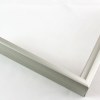Slim 5/16 " metal frame. This frame comes in metallic grey-silver with subtle green undertones. The face has a frosted texture and reflects dispersed light. The profile features a horizontal brushed texture.
Nielsen n22-14 Profile