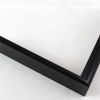 Slim 5/16 " metal frame. This frame comes in solid mars black. The face has a smooth, mirror texture and reflects sharp light. The profile features a horizontal brushed texture.
Nielsen n22-20 Profile
Anodic/Semi-Gloss Black