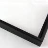 Slim 5/16 " metal frame. This frame comes in solid mars black. The face has a frosted texture and reflects dispersed light. The profile features a horizontal brushed texture.
Nielsen n22-21 Profile