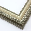 This highly detailed, solid wood frame features three distinct designs. The dominant design tops a deep scoop of smooth, brushed silver foil and meets a small detail on the inner lip. A drop ledge on the outer edge is decorated in a simple dash. Matte areas within the designs create an antiqued look.
2 " width: ideal for medium- to large-size images. The detailed nature of this frame makes it suitable for bright or busy paintings or photographs. It may overpower simpler images.