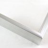 This 7/16 " traditional metal frame is a perfect fusion of timeless design and contemporary flair. With a slim face and deep profile, this frame provides a sleek and elegant presentation for your treasured artwork or photographs. The white silver finish imparts a touch of sophistication, elevating any displayed content to new heights.
Adding a touch of artistic charm, the frame features a horizontal brushed texture that adds subtle visual interest and depth. The texture enhances the overall appeal, creating a captivating interplay of light and shadows.
Designed to disperse light gracefully, this frame ensures that your displayed content is showcased brilliantly, while avoiding distracting glares. Embrace the beauty of simplicity and elegance with this exquisite metal frame, a perfect addition to any space that demands both style and refinement.
Nielsen n35-01 Profile