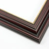 This stepped, reverse scoop frame with raised outer edge features a mahogany wash that maintains the natural wood grain. The recesses of the profile are matte black, with a cracked gold foil on the inner lip.
1.75 " width: ideal for medium size images. A wide variety of photographs, paintings and prints will be enhanced within this unique frame.