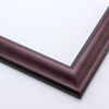 This reverse scoop frame with bevelled inner lip features a mahogany wash. The thin veneer maintains the natural wood grain texture across the short edge. Both the outer drop edge and inner lip are matte black.
1.375 " width: ideal for small images. This simple, elegant frame flatters photographs, watercolour or oil paintings, and giclee prints alike.