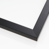 This simple, matte shine frame features a smooth black face that does not obscure the rich, natural wood grain. It is a delicate, modern take on a basic style.
1 " width: ideal for small images. Border a bold, white-dominant greyscale photograph, or acrylic painting or print in this subtle frame.
