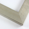 This simple, high-sheen frame features a smooth face of gold-brushed, silver foil finish. Hints of the natural wood grain show through for a delicate, modern take on a basic style.
1.75 " width: ideal for medium and large images. Border a bold greyscale photograph or acrylic painting or Giclée print in this subtle, contemporary frame.