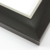 This simple, bold frame features scoop profile and matte black face with subtle crosshatching. The inner lip is stepped down and covered in silver foil.
2.75 " width: ideal for large and extra large artworks. Due to it