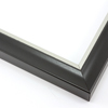 This simple, bold frame features scoop profile and matte black face with subtle crosshatching. The inner lip is stepped down and covered in silver foil.
1.25 " width: ideal for small or medium size artworks. Due to it