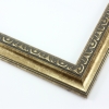 This classic, Victorian-style frame features a solid wood, reverse scoop profile. The relief-detailed inner lip and sloped face are a textured gold foil, edged in a subtle bevel.
1.25 " width: ideal for small images. Border an acrylic or oil painting or print with this antiqued, high fashion frame.