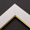 Linen liners are a great option for providing white space between art and frame. Where glass is generally required to protect paper artwork and its mat, a linen liner does not require glass, making it perfect for paintings and Giclée prints.
This 2 " white liner has an authentic linen texture and a bevelled gold lip. It is ideal for small, medium or large canvas prints, watercolours or oil paintings.